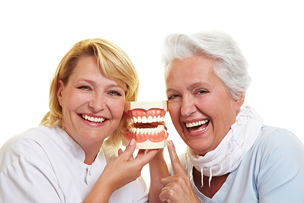 Benefits Of Implant Anchored Dentures Vs  Traditional Dentures